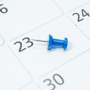 calendar with a push pin on it